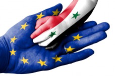 Man holding baby hand, Europen Union and Syria flags overlaid